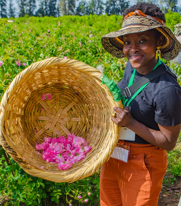 A women holding a basket of flowers